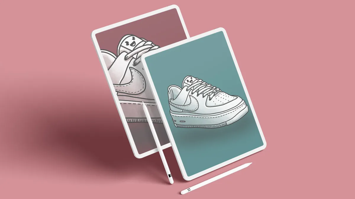 Two tablets with styluses and illustrations of Nike sneakers on their screens.